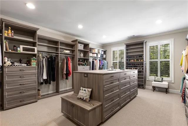 an aerial view of multiple houses with yard