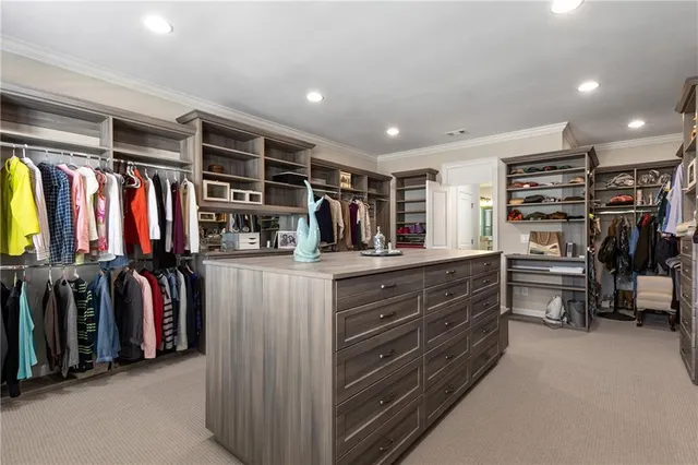 an aerial view of residential house with outdoor space and swimming pool