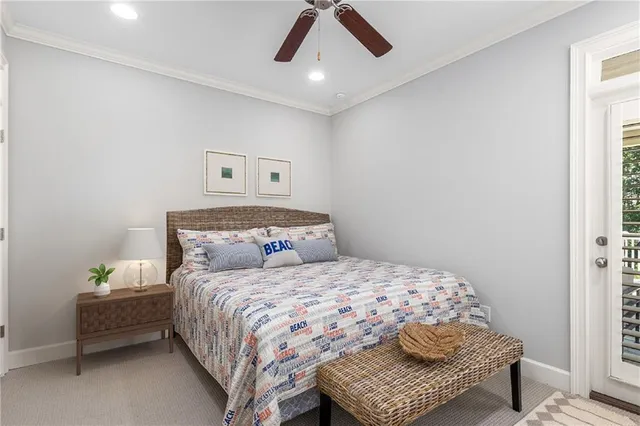 a view of a barn with a large window and large trees