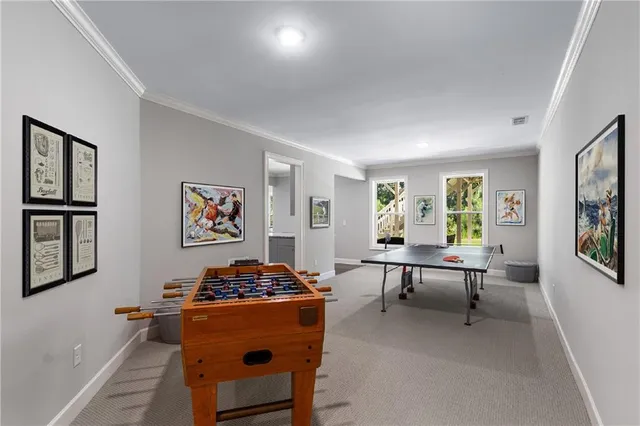 a room with gym equipment and window