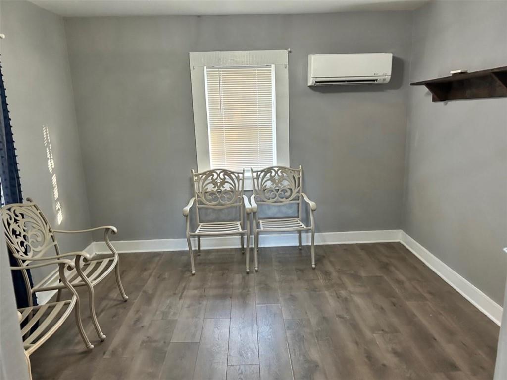 930 Cantrell Road Marble Hill, GA 30148 - Photo 13 of 37 a view of a room with chairs and wooden floor