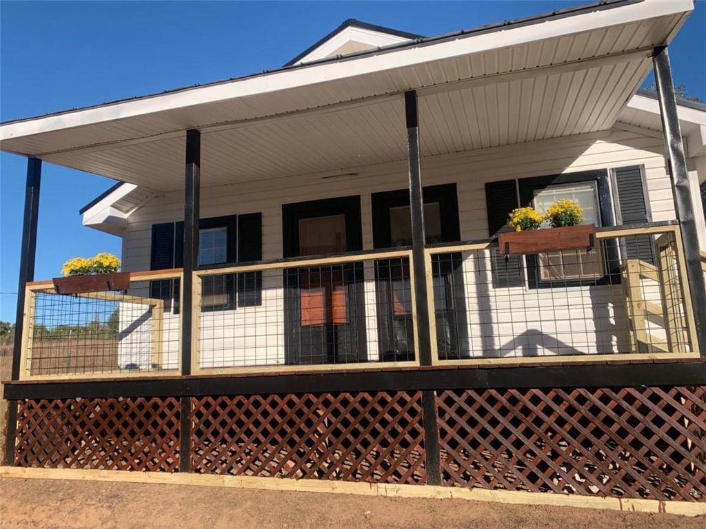 930 Cantrell Road Marble Hill, GA 30148 - Photo 2 of 37 a front view of a house