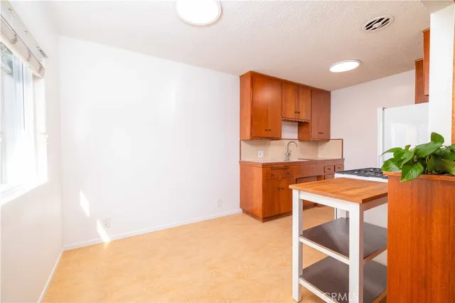 a room with a table and chairs