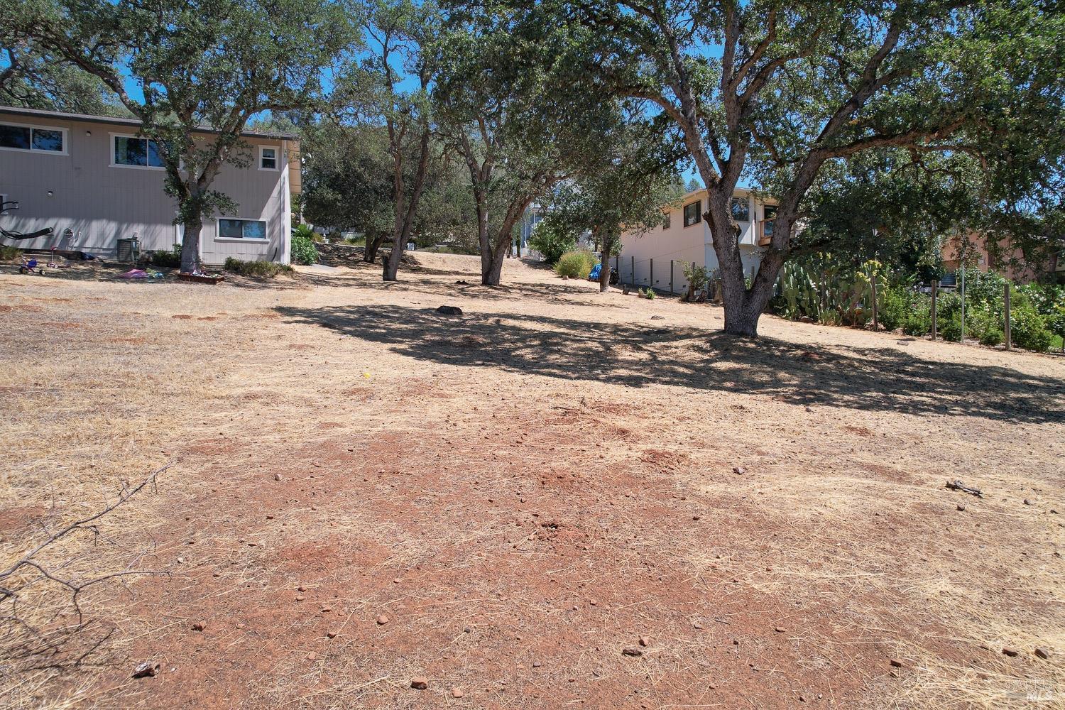 18903 Deer Hill Road Hidden Valley Lake, CA 95467 - Photo 3 of 32 A view of the vacant lot for sale.