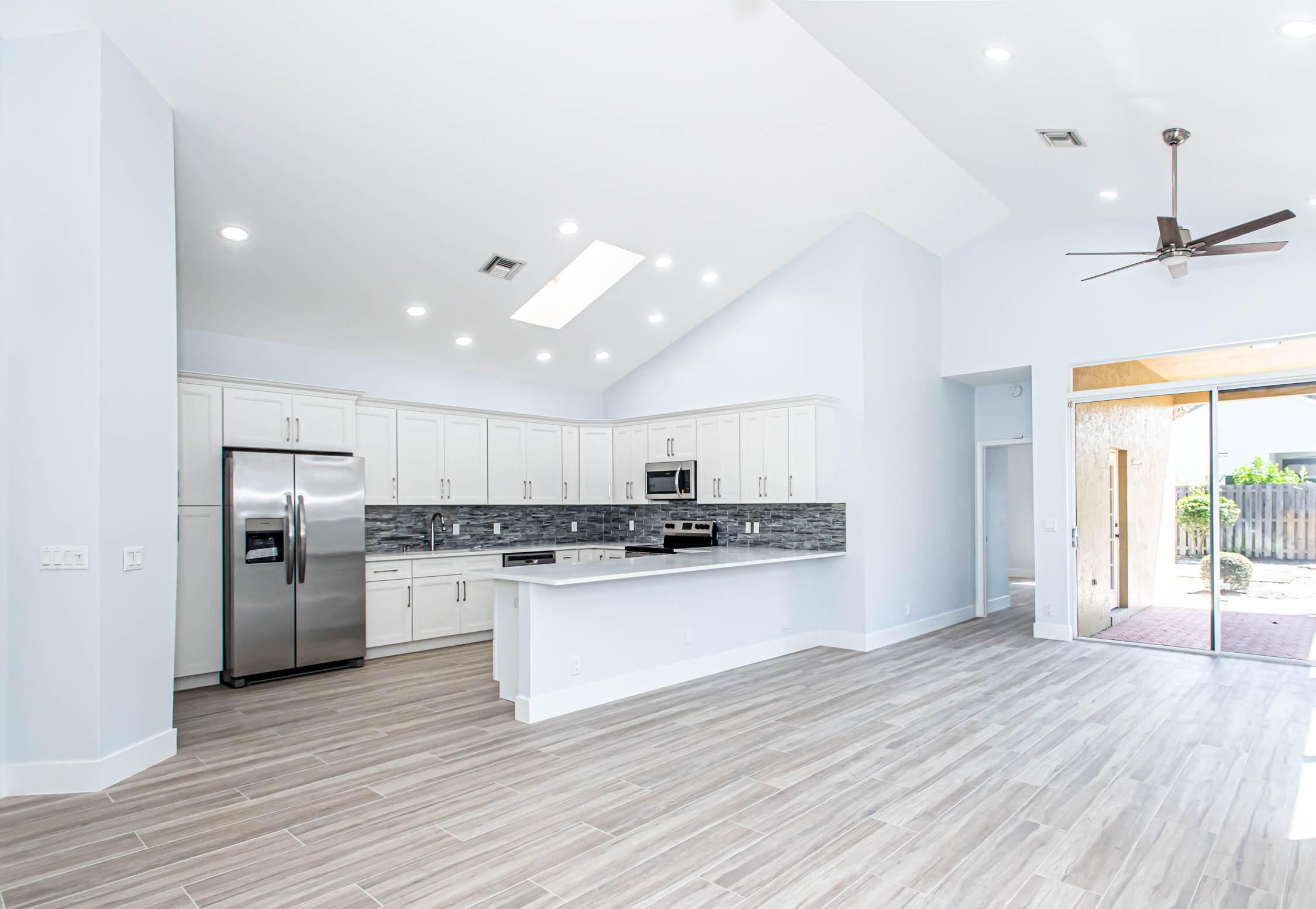 6656 Northwest 25th Way Boca Raton, FL 33496 - Photo 8 of 31 Great room with sliders to back patio