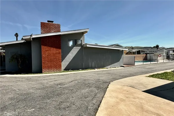 a house view with a outdoor space