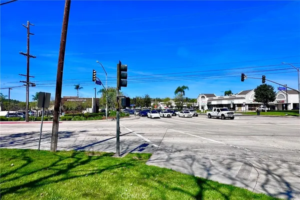 a view of a street with cars