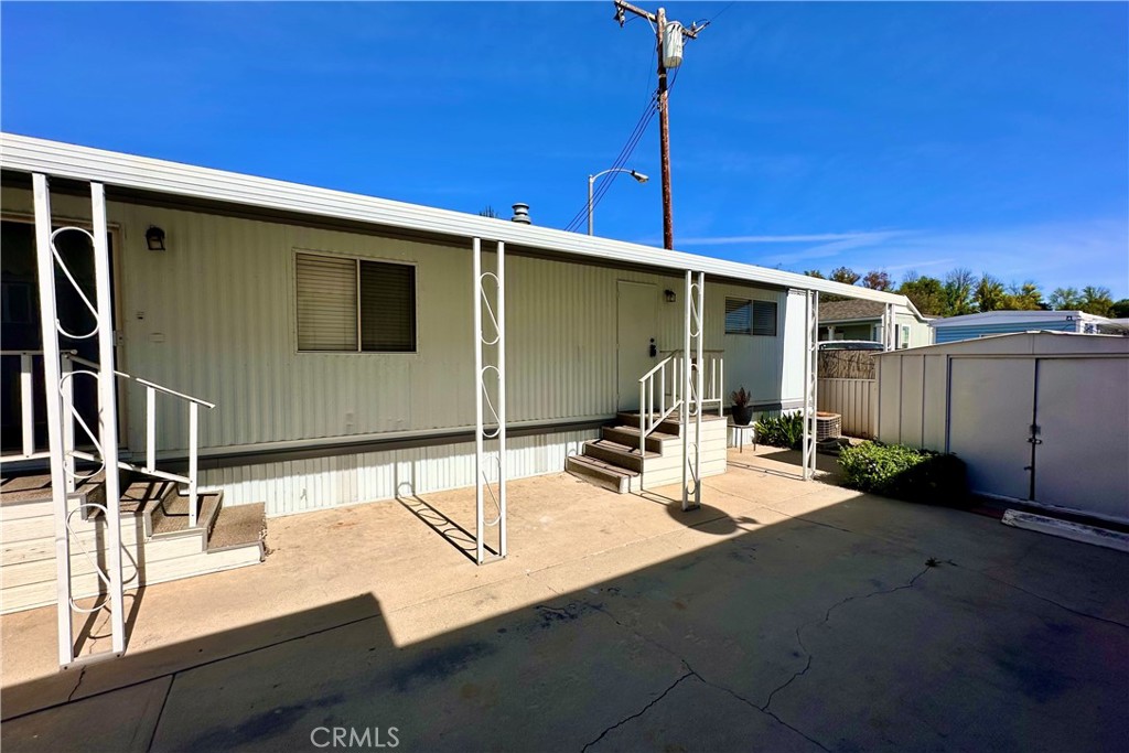 3825 Valley Boulevard, Unit 46 Walnut, CA 91789 - Photo 3 of 17 a view of a patio with table and chairs