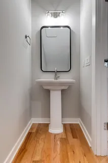 a bathroom with a mirror