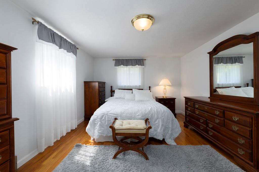 11 Crestwood Drive Cecil, PA 15321 - Photo 14 of 30 a bed room with a bed and a lamp