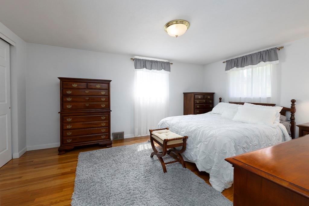 11 Crestwood Drive Cecil, PA 15321 - Photo 15 of 30 a bedroom with bed and wooden floor