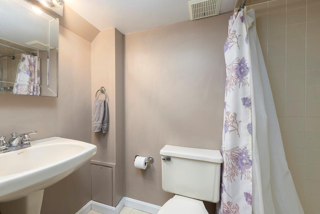 11 Crestwood Drive Cecil, PA 15321 - Photo 24 of 30 a bathroom with a sink and toilet