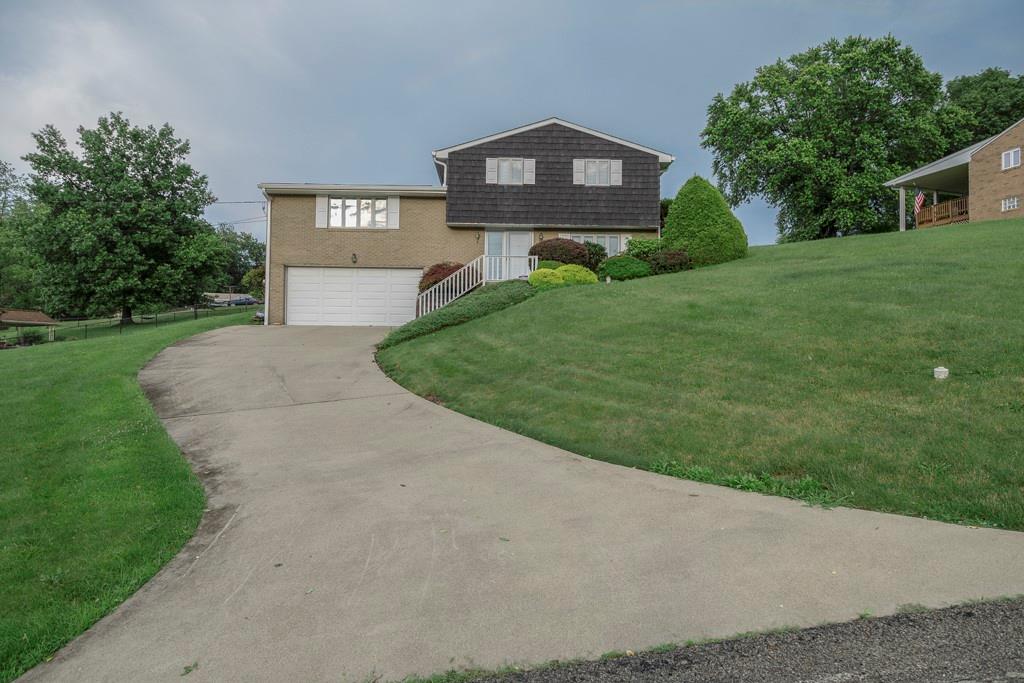 11 Crestwood Drive Cecil, PA 15321 - Photo 26 of 30 a front view of a house with a yard