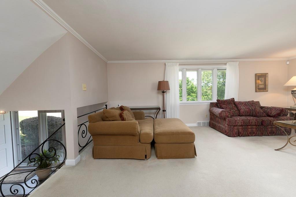 11 Crestwood Drive Cecil, PA 15321 - Photo 8 of 30 a living room with couches and a flat screen tv