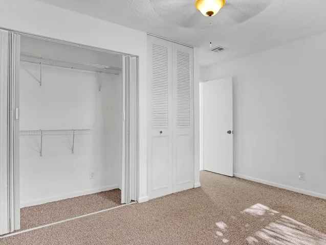 an empty room with closet