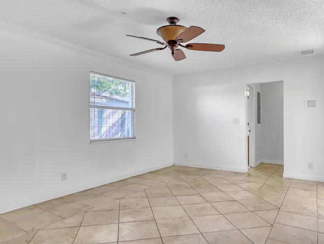 a view of a kitchen with a sink and cabinet area