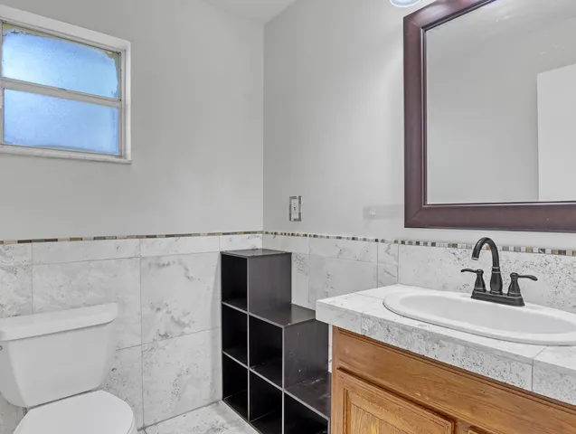 a view of a swimming pool with a lounge chair