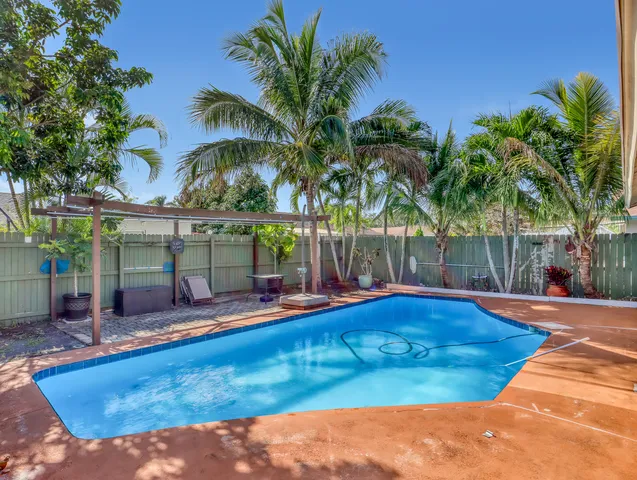 a view of a house with a swimming pool