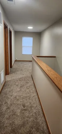 a view of an empty room and window