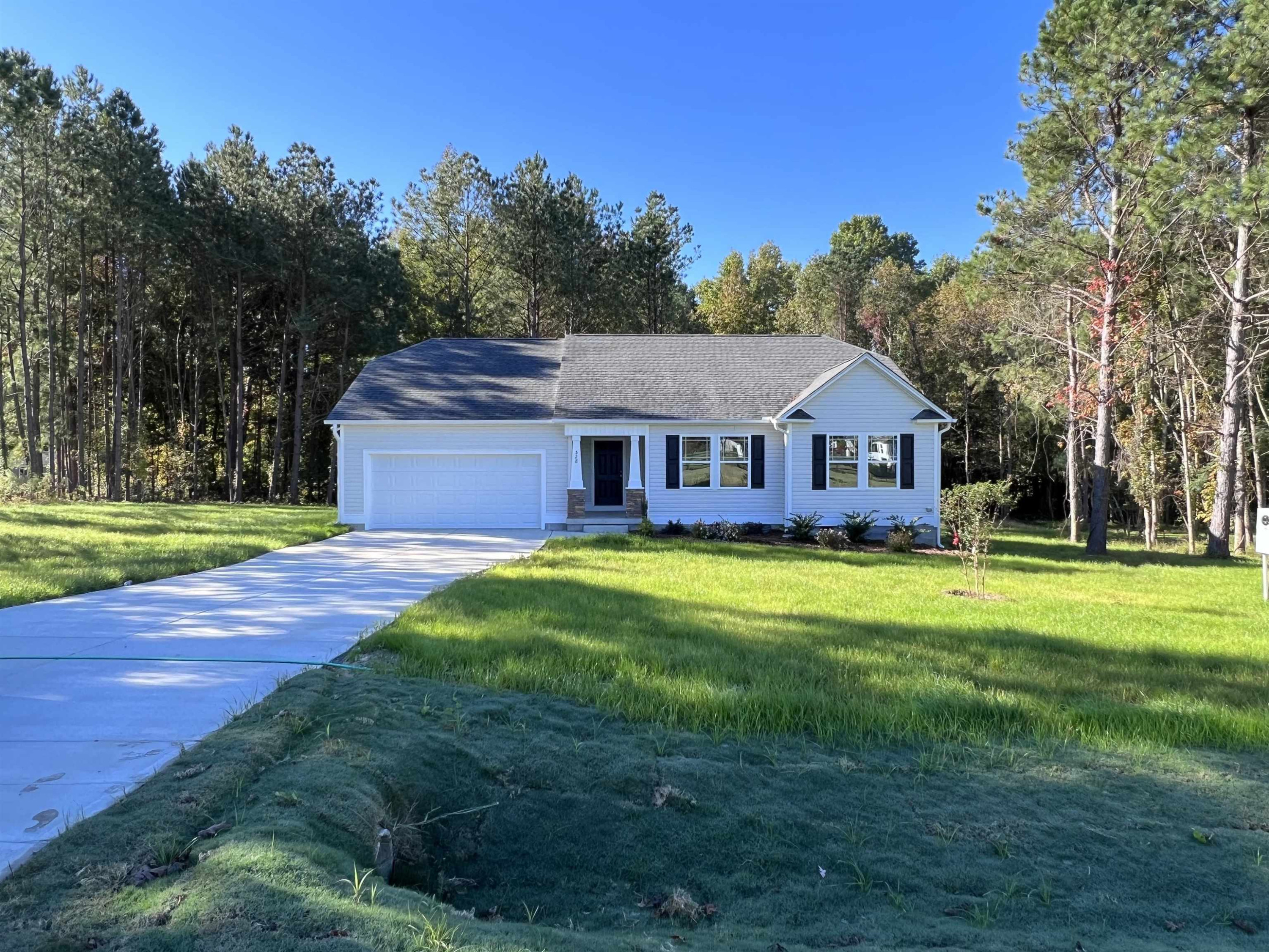 528 Roberts Road Willow Spring, NC 27592 - Photo 3 of 19 a aerial view of a house with swimming pool