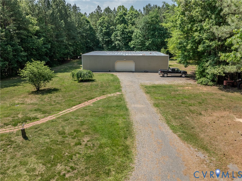 8025 Colemans Lake Road Church Road, VA 23850 - Photo 3 of 21 a view of a yard with potted plants