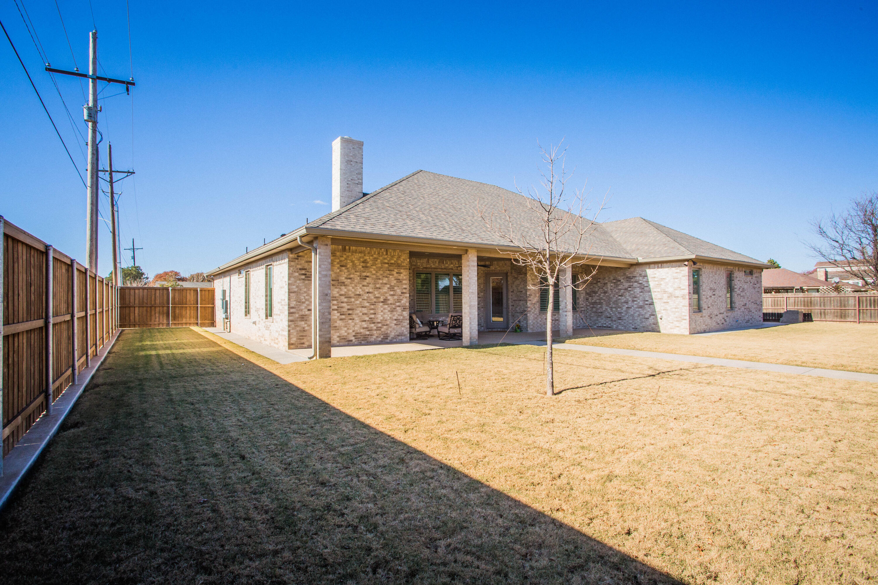 209 South Holliday Plainview, TX 79072 - Photo 24 of 29 a view of a house with a backyard