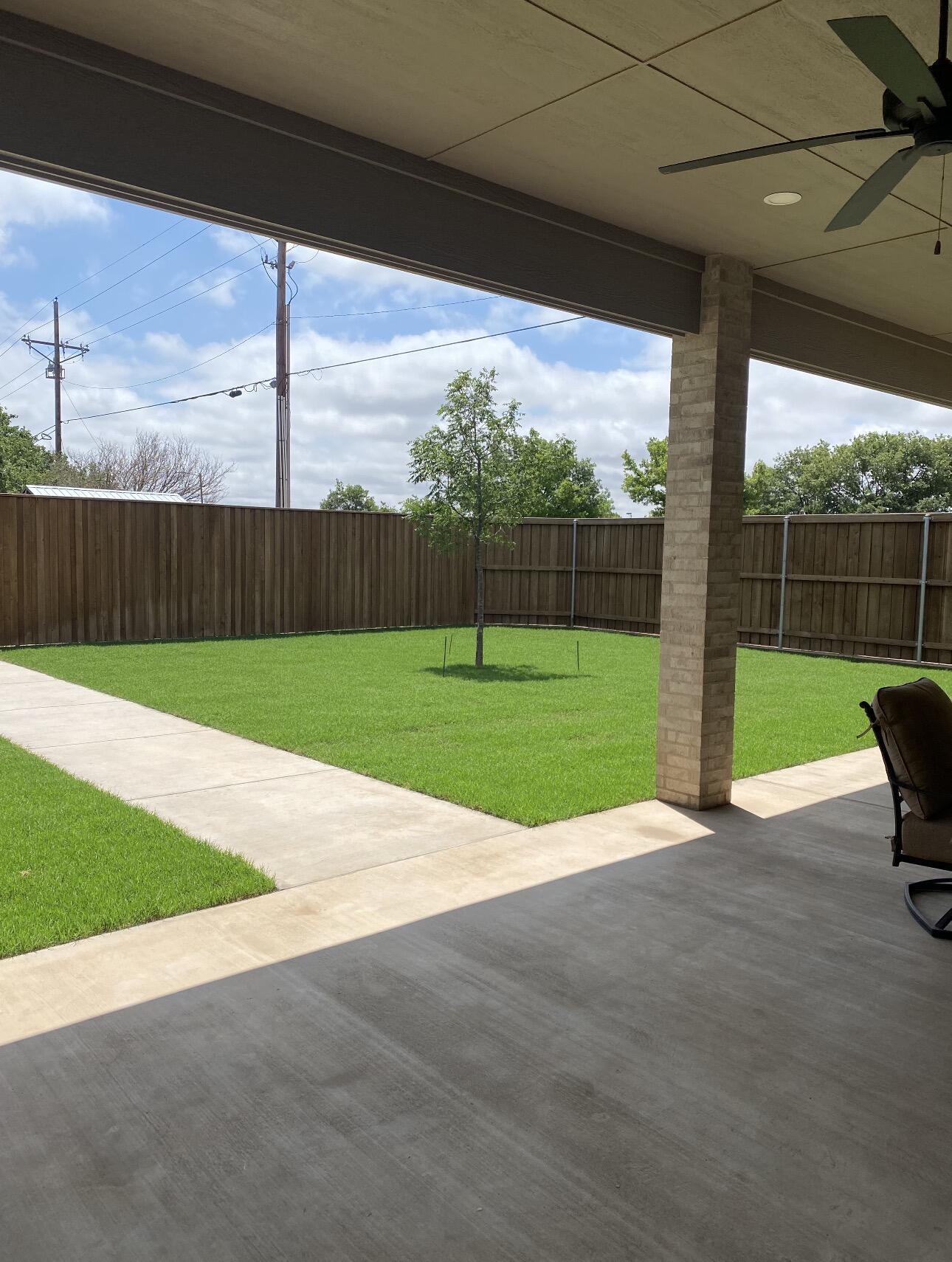 209 South Holliday Plainview, TX 79072 - Photo 27 of 29 a view of a room with wooden fence