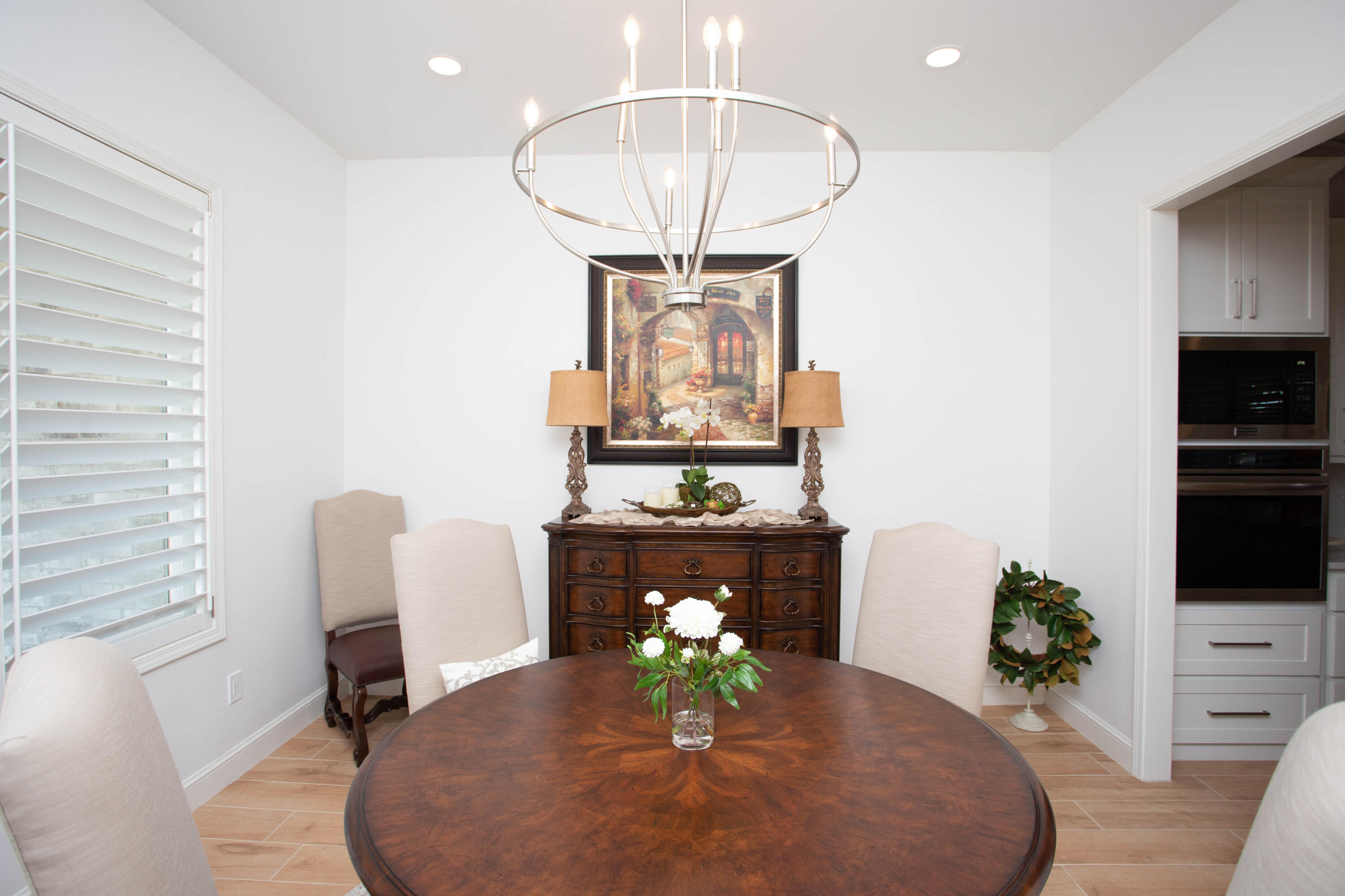 209 South Holliday Plainview, TX 79072 - Photo 7 of 29 a living room with furniture and a chandelier