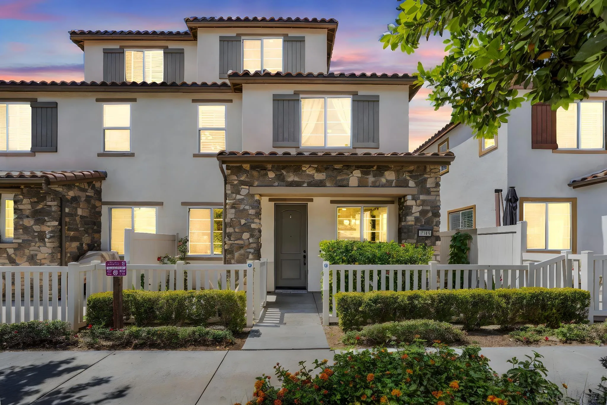 1319 Keck Road Chula Vista, CA 91913 - Photo 1 of 49 a front view of a house with a yard