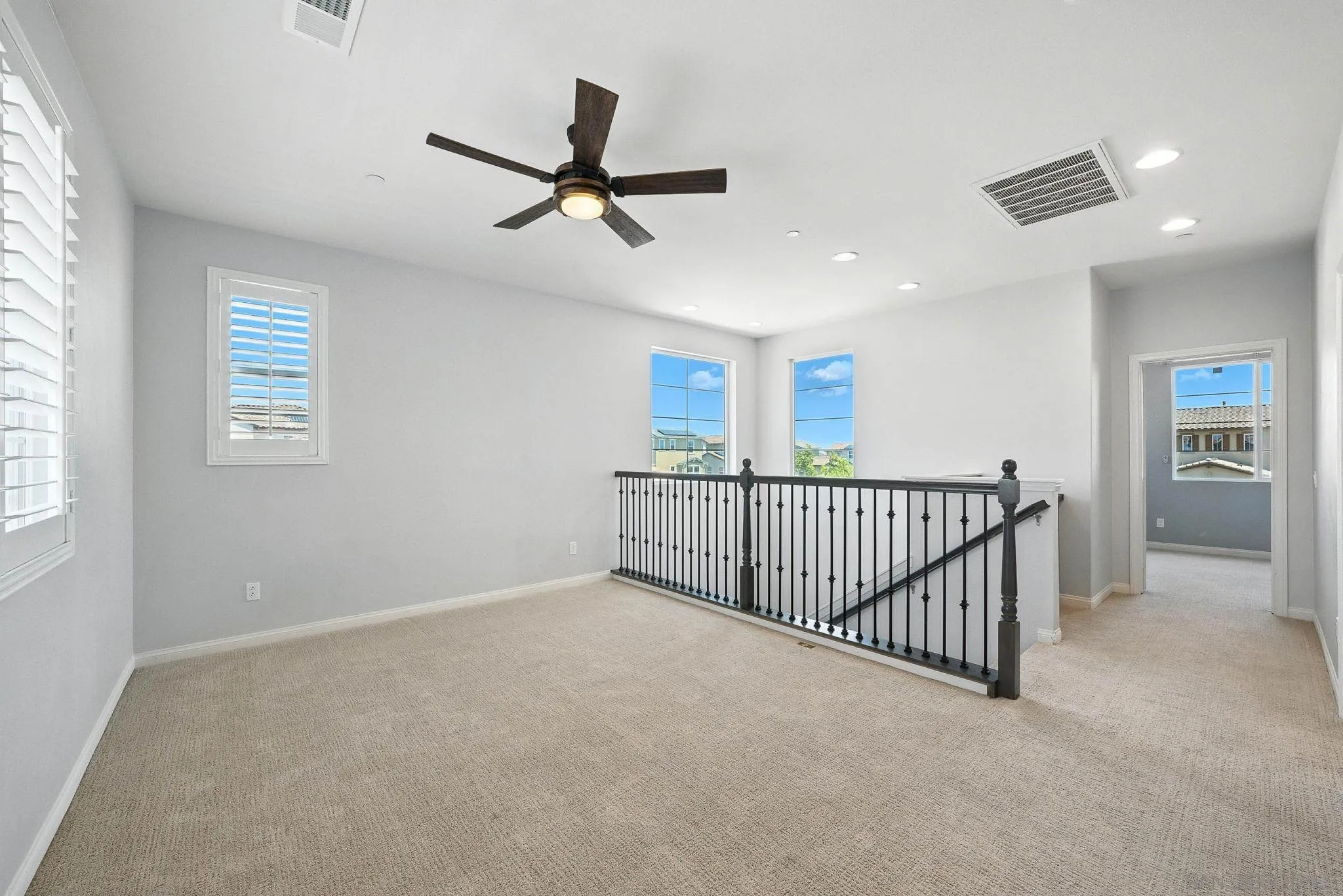 1319 Keck Road Chula Vista, CA 91913 - Photo 11 of 49 a view of a hallway with a ceiling fan