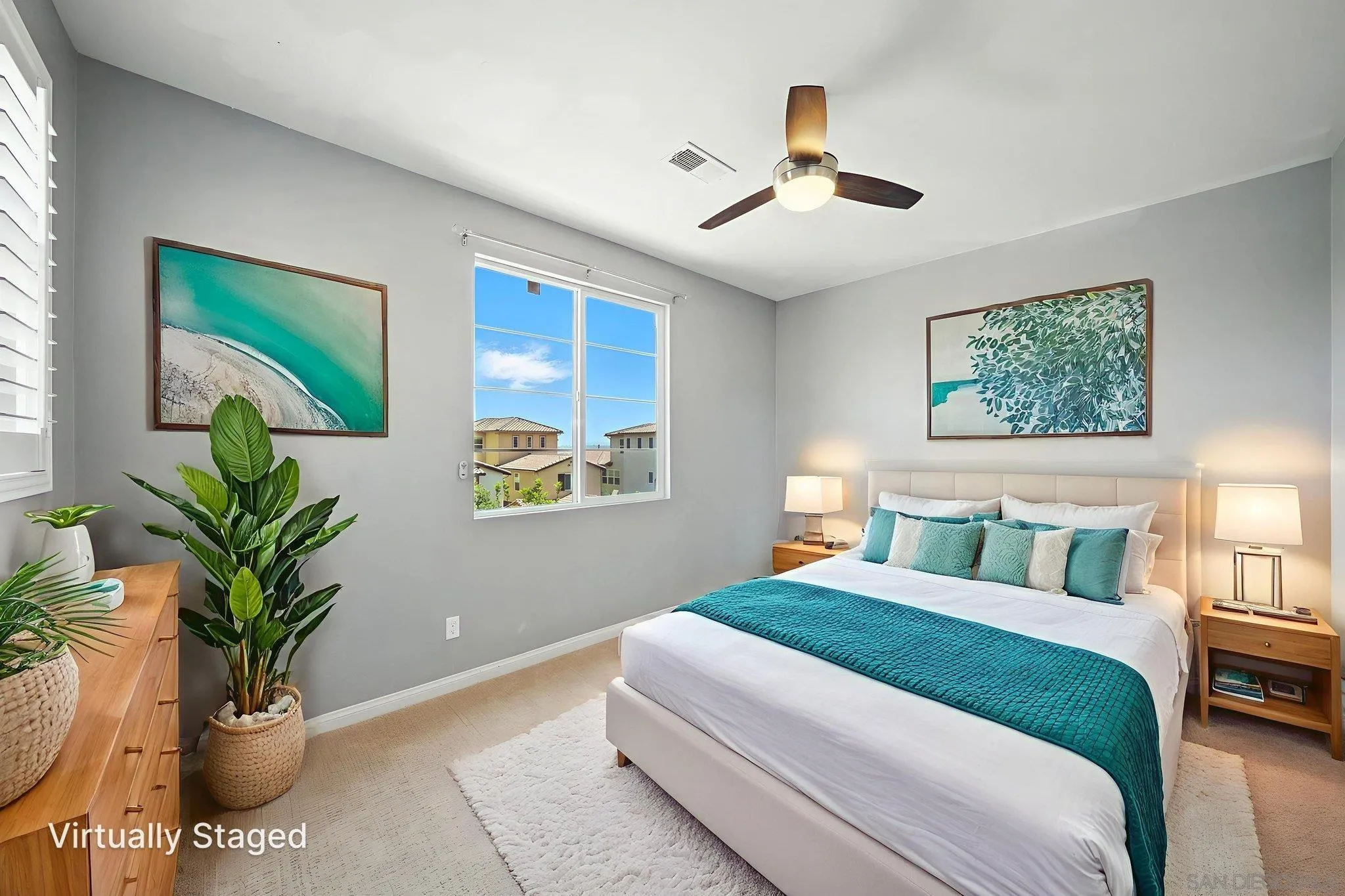 1319 Keck Road Chula Vista, CA 91913 - Photo 14 of 49 a bedroom with a large bed and a potted plant