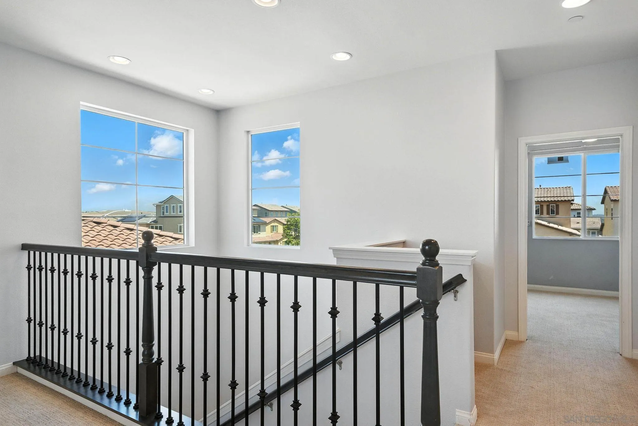 1319 Keck Road Chula Vista, CA 91913 - Photo 16 of 49 a view of a hallway with a window
