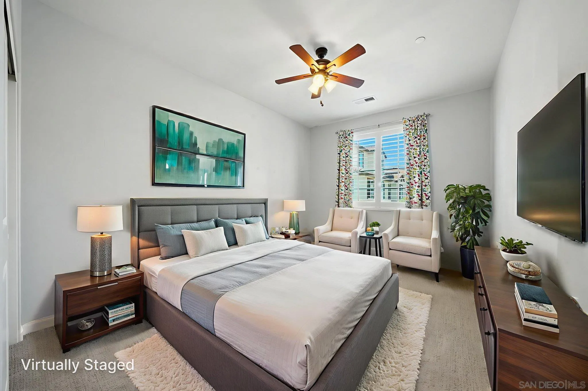 1319 Keck Road Chula Vista, CA 91913 - Photo 17 of 49 a bedroom with bed and a flat screen tv
