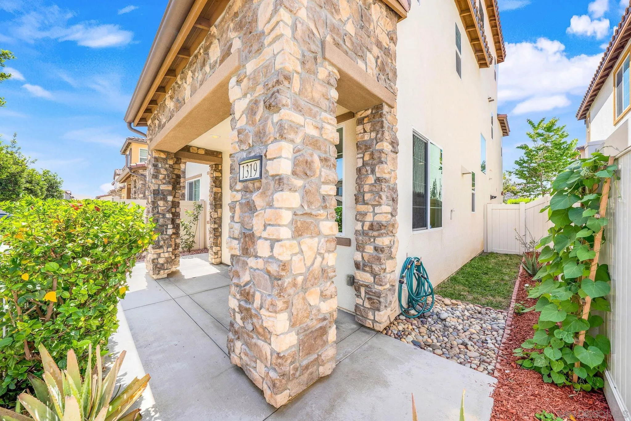 1319 Keck Road Chula Vista, CA 91913 - Photo 22 of 49 a view of a pathway with a yard