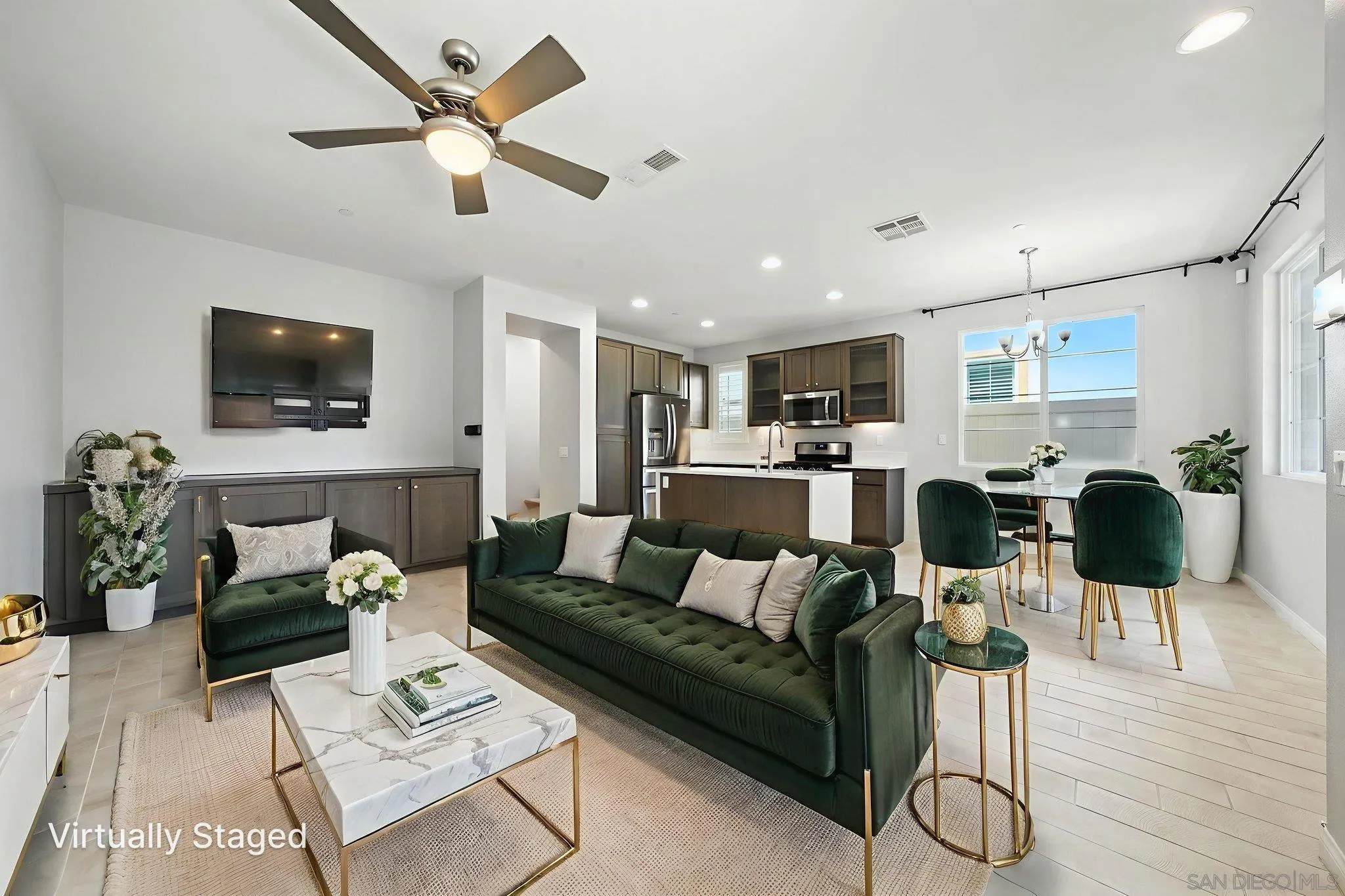 1319 Keck Road Chula Vista, CA 91913 - Photo 4 of 49 a living room with furniture kitchen view and a wooden floor