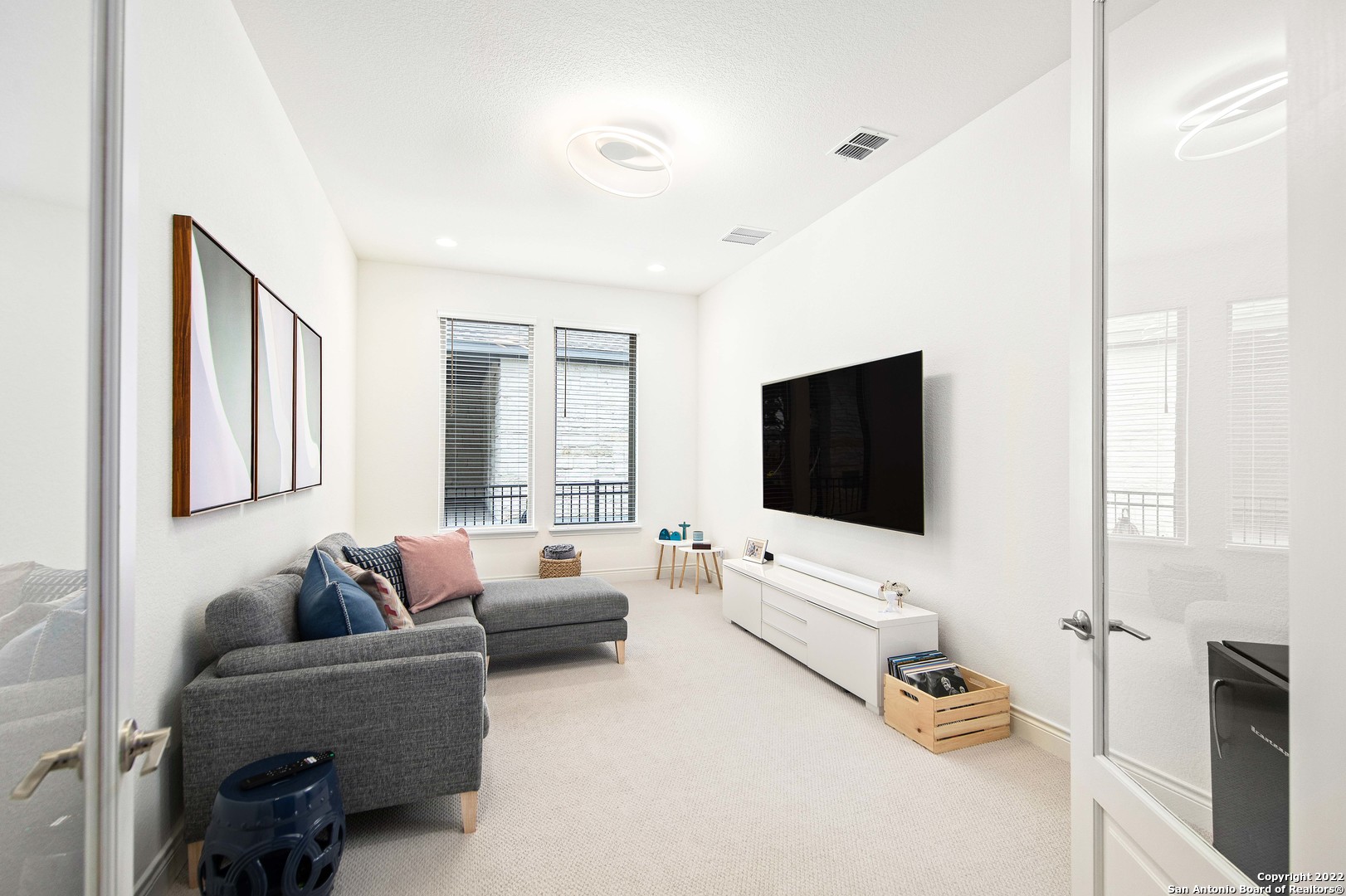 106 Milagro Boerne, TX 78006 - Photo 14 of 29 a living room with furniture and a flat screen tv