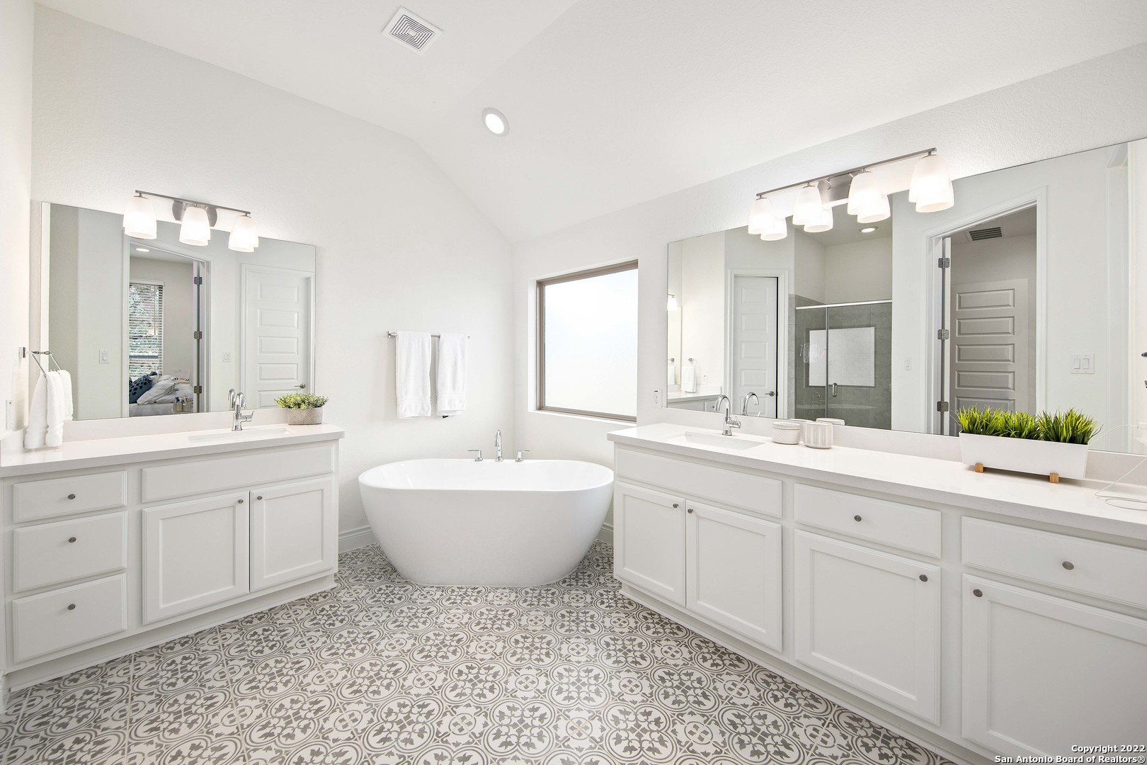 106 Milagro Boerne, TX 78006 - Photo 17 of 29 a spacious bathroom with a double vanity sink mirror and bathtub
