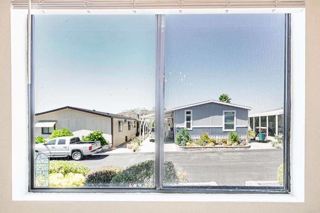 4650 Dulin Road, Unit 178 Fallbrook, CA 92003 - Photo 11 of 53 a view of a porch in front of a house
