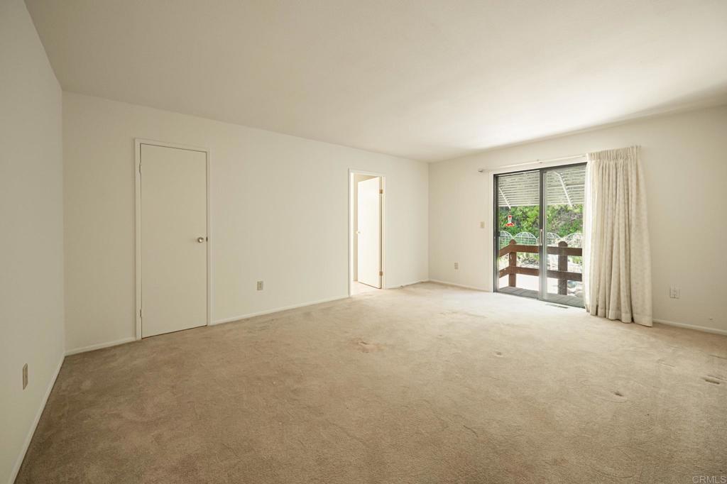 4650 Dulin Road, Unit 178 Fallbrook, CA 92003 - Photo 20 of 53 a view of an empty room with a window