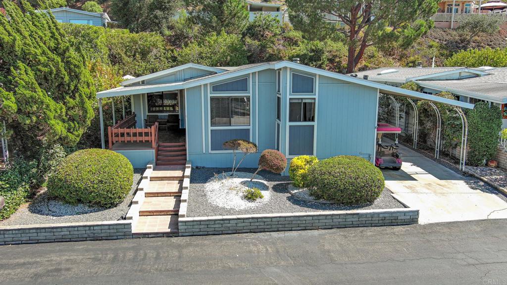 4650 Dulin Road, Unit 178 Fallbrook, CA 92003 - Photo 2 of 53 a backyard of a house with yard and outdoor seating