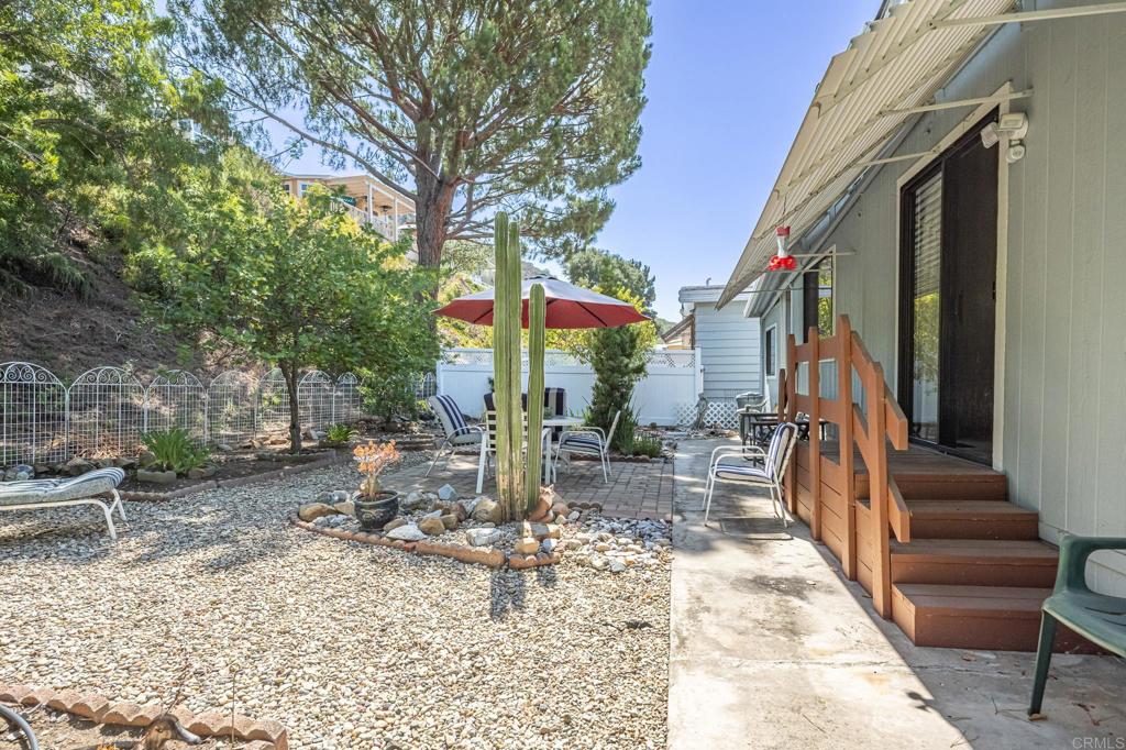 4650 Dulin Road, Unit 178 Fallbrook, CA 92003 - Photo 22 of 53 a view of a house with backyard