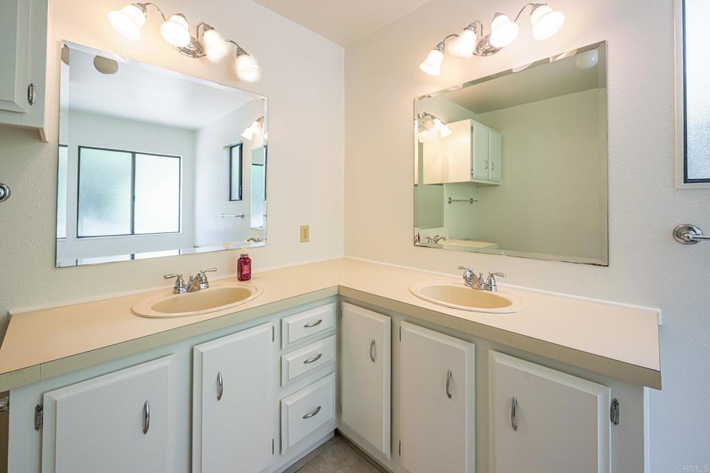 4650 Dulin Road, Unit 178 Fallbrook, CA 92003 - Photo 27 of 53 a bathroom with a sink and a mirror