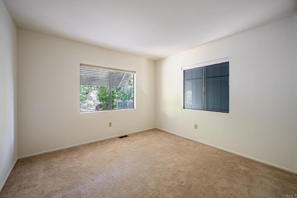 4650 Dulin Road, Unit 178 Fallbrook, CA 92003 - Photo 30 of 53 an empty room with windows