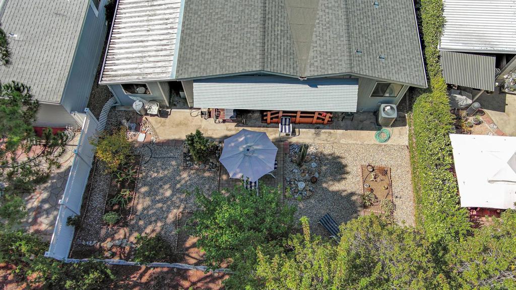 4650 Dulin Road, Unit 178 Fallbrook, CA 92003 - Photo 35 of 53 an aerial view of a house with yard and trees