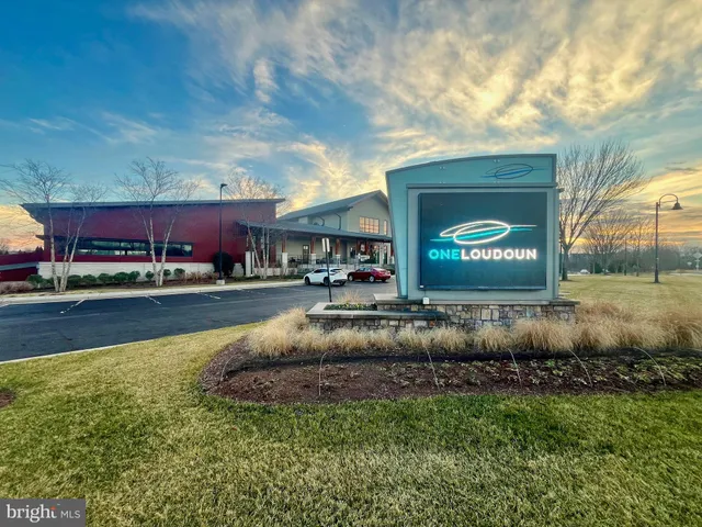 a view of a building with a street