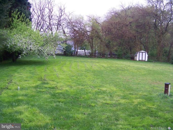 75 Cambridge Road Elkton, MD 21921 - Photo 2 of 7 a view of a park with large trees