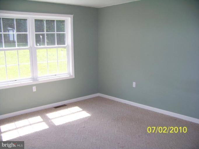 75 Cambridge Road Elkton, MD 21921 - Photo 7 of 7 an empty room with a window
