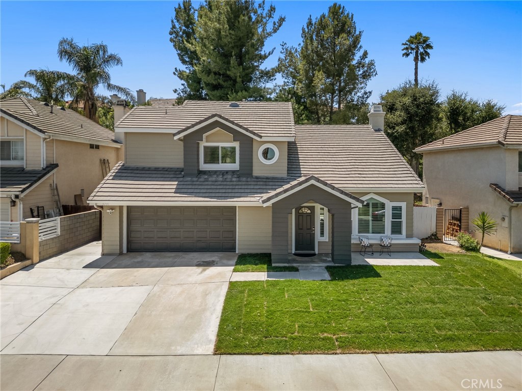 5731-5731 Applecross Drive Riverside, CA 92507 - Photo 1 of 1 a front view of a house with a yard
