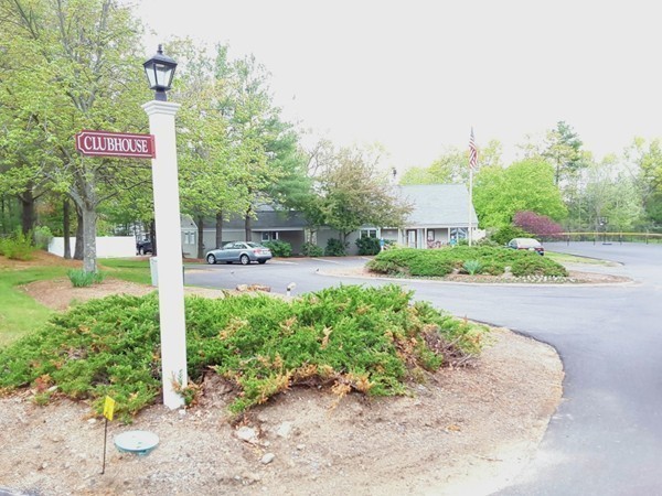 161 Stone Ridge Road, Unit 161 Franklin, MA 02038 - Photo 20 of 23 a street sign on a sidewalk next to a road