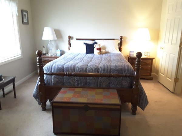 161 Stone Ridge Road, Unit 161 Franklin, MA 02038 - Photo 7 of 23 a bedroom with a bed and a window